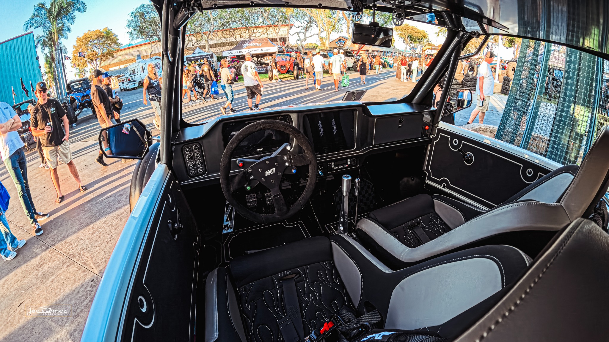 Midnight Ace cockpit with flame-pattern seat stitching, steering wheel and center controls